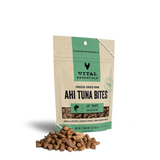 Bag of Vital Essentials Freeze-Dried Ahi Tuna Bites Cat Treats. A small pile of the treats is in front of the bag. 